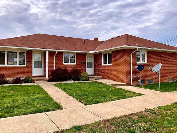 Doors to 870 E 248th St., and shared access to both units and shared basement