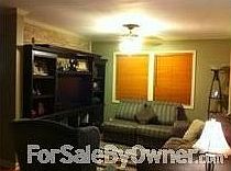 Den : This is the den. I use it as a living room. It is very cozy.