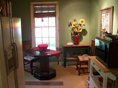Breakfast Nook connected to Kitchen. Refrigerator has now been upgraded to 2 door, Stainless-Steel.