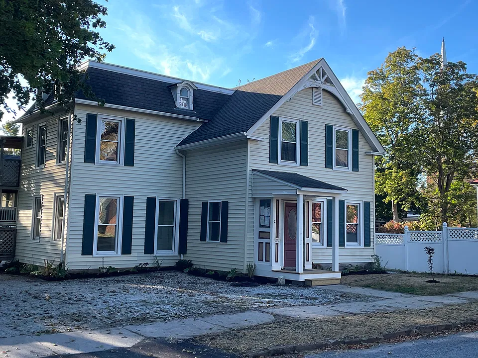 Street View. Shrubs were planted in fall and lawn is seeded. Ready for Spring.