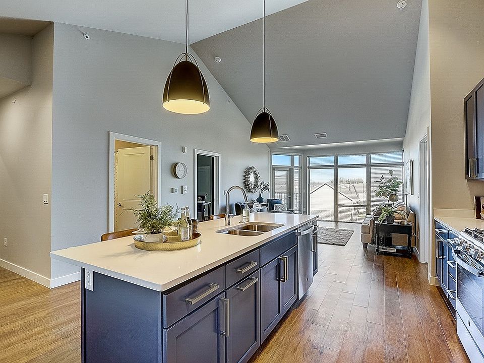 Kitchen with pull out trash/recycling