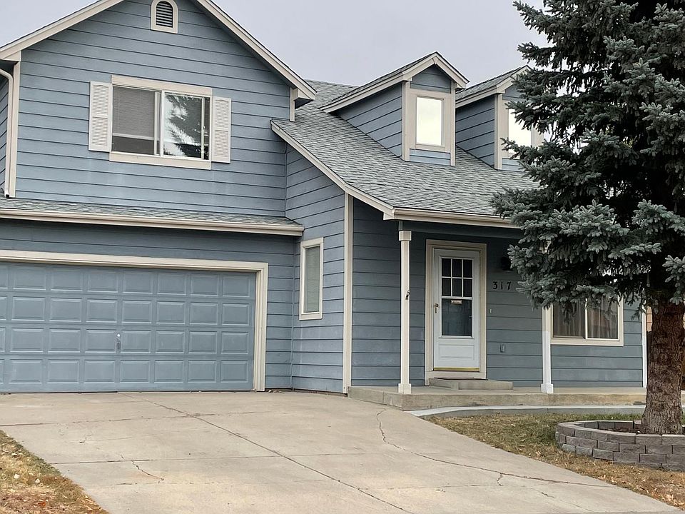 Neighborhood home with 2 car garage and off street parking