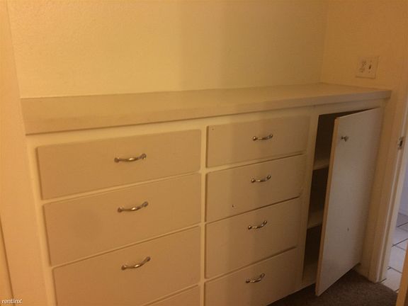 BUILT-in dresser drawers with a LARGE walk-in closet