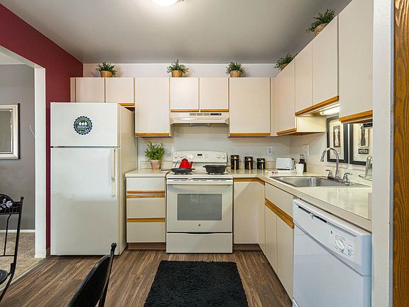 Cozy kitchen with breakfast nook at Park Lane Apartments in Southfield, MI