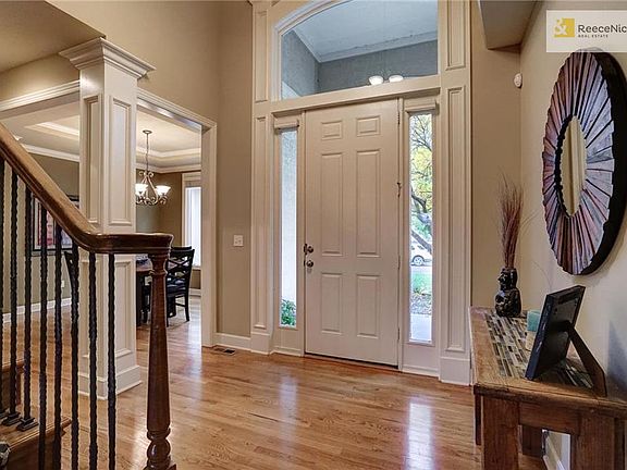 Upon entering you are greeted with lush hardwood floors, and grand two story entry.