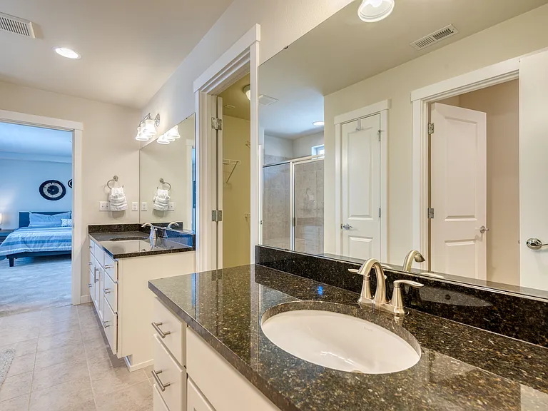 Luxurious Primary Bathroom with Walk in Shower and Huge Closet. Perfect for longer stays