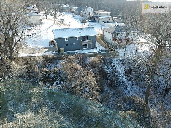 Lot extends down the hill. Completely treed and beautiful views in summer months.