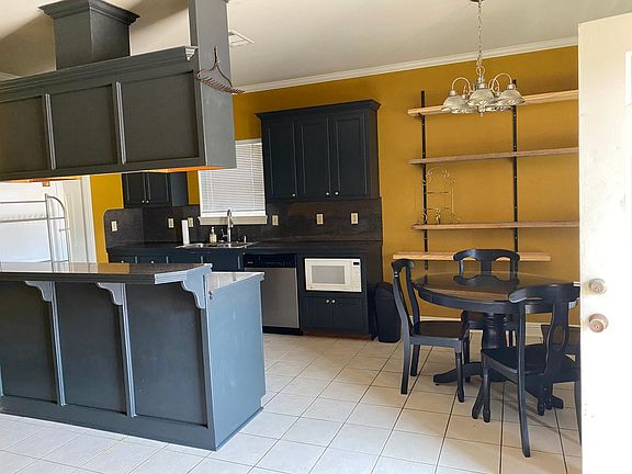 Kitchen, dinning room, bar area
