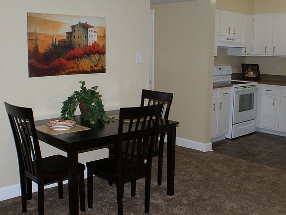 furnished with table and chairs