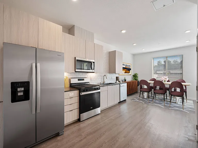 Experience the perfect blend of space and light with an open concept floor plan and large, inviting windows.
