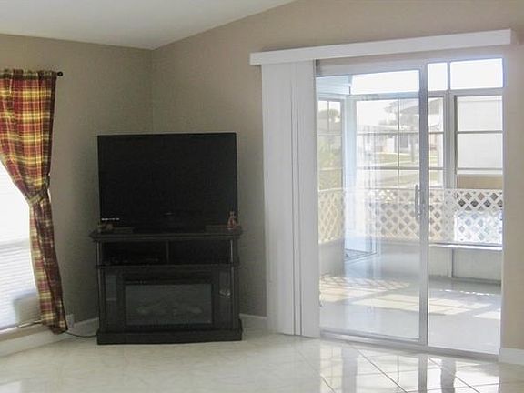 Livingroom slider opens to year round room