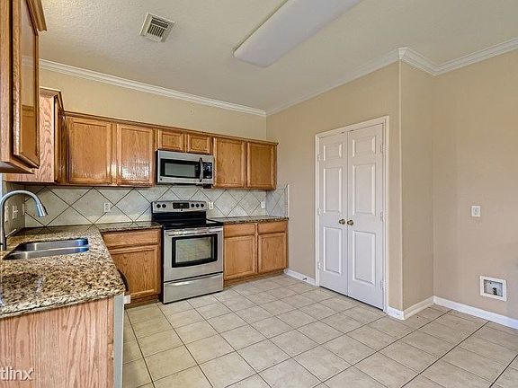 3rd image of 9711 Sugarblossom Ln
