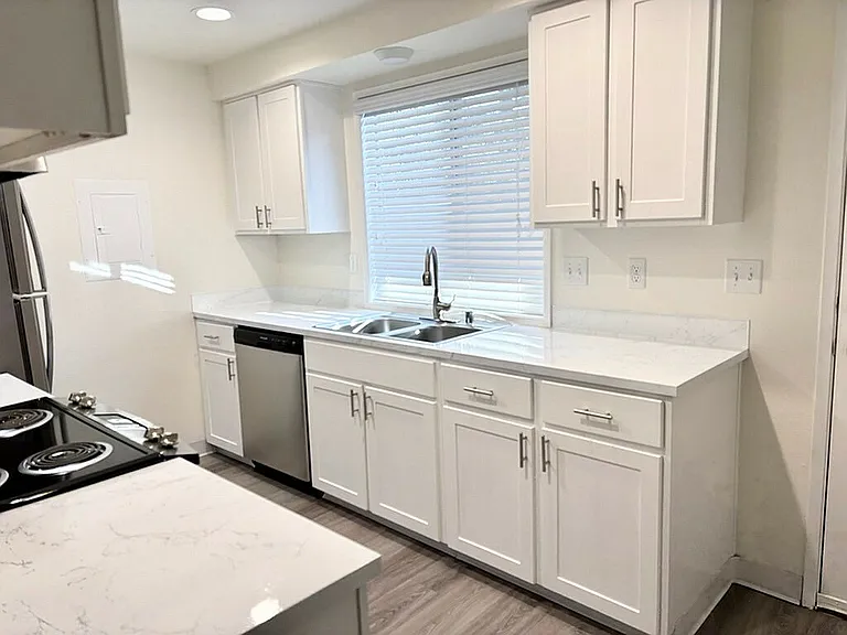 Experience culinary excellence in this sleek and stylish kitchen, perfect for both cooking and entertaining.