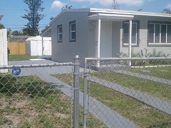 FRONT AND SIDE OF HOME