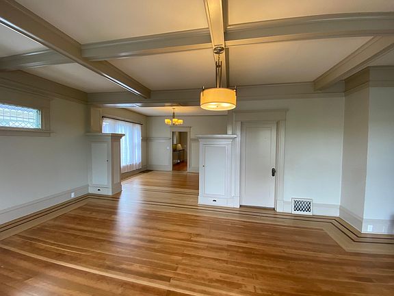 Living room, looking toward dining room and kitchen.