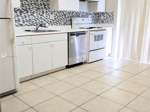 4th image of 6900 NW 179th St APT 207-1