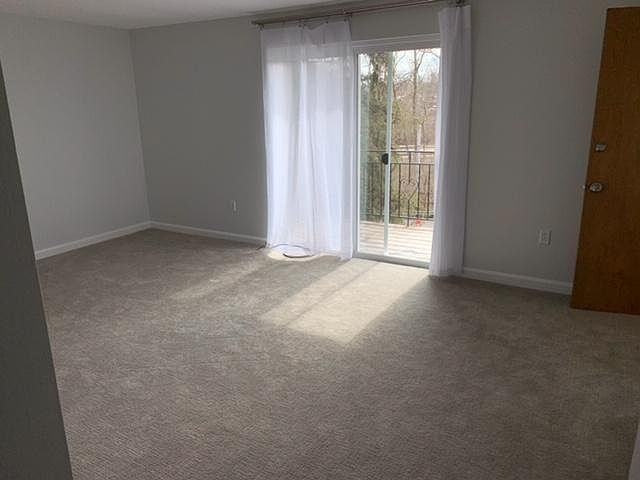 Living room with doors to the balcony