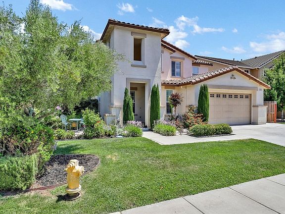 Plenty of grass for outdoor fun and this home is located very near to Ustach Middle School and park....