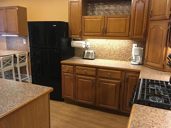 Kitchen
Includes Refrigerator, Gas Range, Dishwasher, Built-in Microwave, Garbage disposal