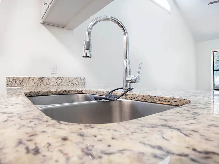 Kitchen sink with pull-down faucet