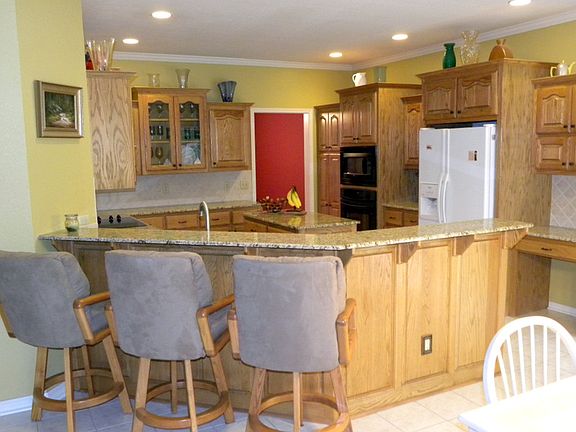 Granite kitchen updated and open.