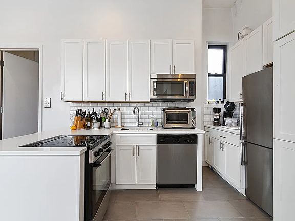 2nd image of 231 E 14th St APT 6F