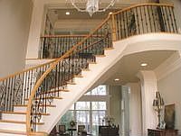Welcome guests in the dramatic two-story foyer with marble floors. 