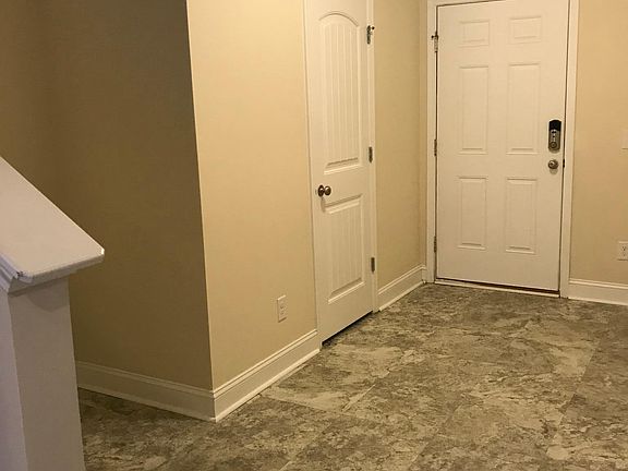Foyer with 1/2 bathroom