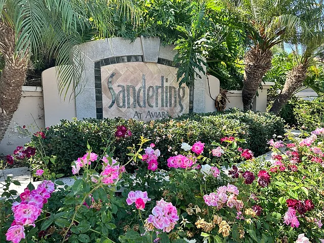Entryway sign into beautiful Sanderling condominium complex. Sanderling condominiums in Carlsbad, CA feature Mediterranean-inspired architecture and are primarily located in the gated, highly desirable Aviara community.