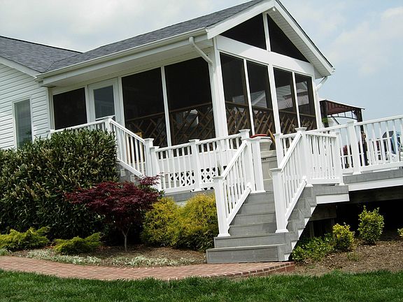 Private fenced backyard w/screened porch and huge deck