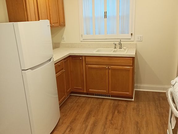 Kitchen, w recessed lighting, custom shutters, brand-new cabinets, counters, sinks and appliances.