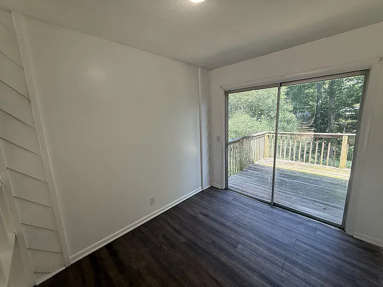Dining area leads to rear deck