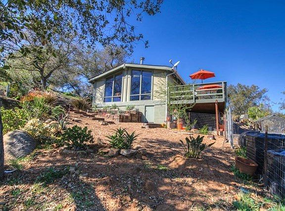 View of the home & deck