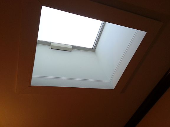 Two electical skylights