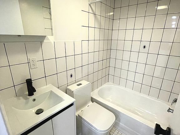 3rd image of 413 E 9th St APT 3G