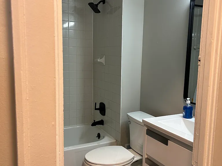 Bathroom with new vanity/lighting and new flooring