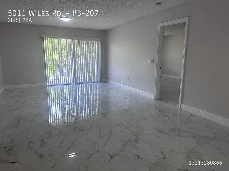 5011 Wiles Rd #3-207 — Photo 3