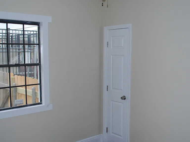 Third bedroom at rear of home.