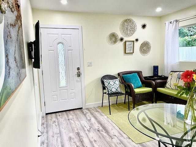Private entry. Living room with Kitchenette and AC.