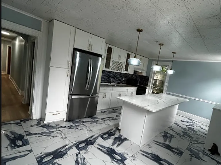 1638 Sanderson Ave — Photo 52