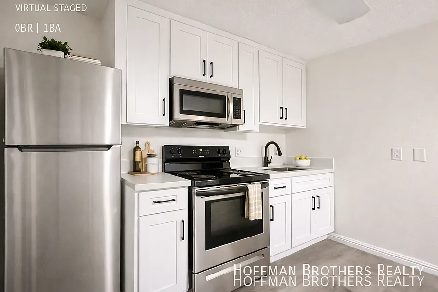 Building Photo - 13059 Oxnard St #104