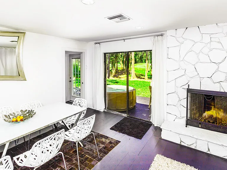 Dining area with fireplace.