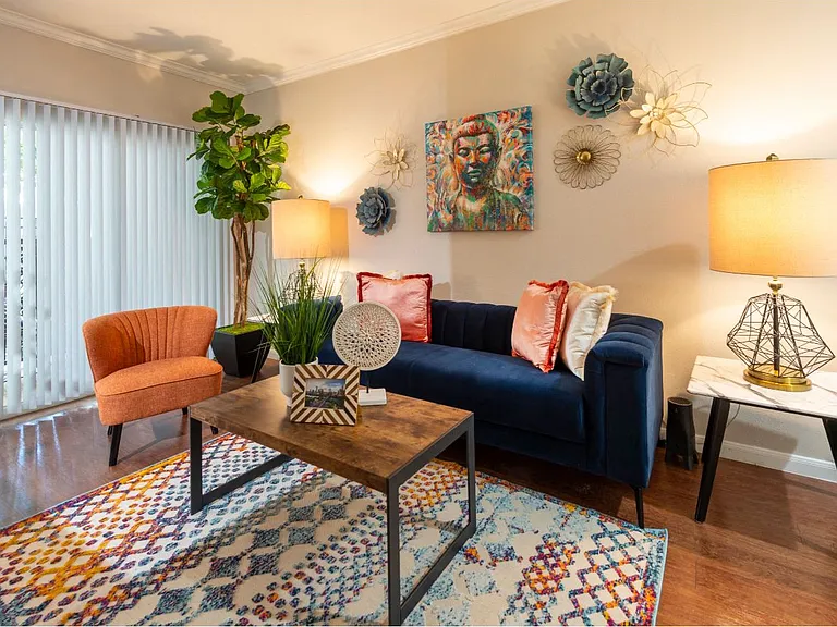 Midtown model living room to patio view