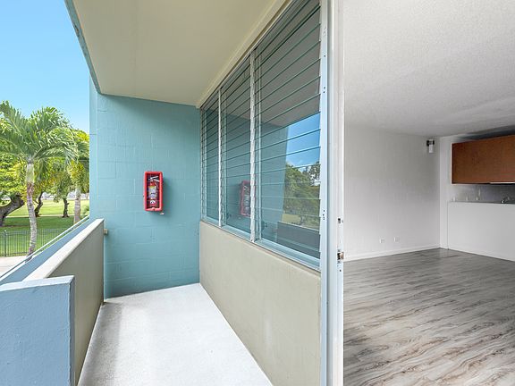 Enjoy the breeze from your private lanai with easy access to bright and open living spaces.