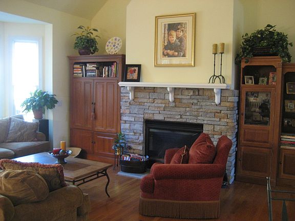 sun-filled great room with gas fireplace