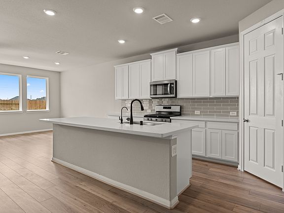 Kitchen. Note Sample product photo - actual exterior and interior selections may vary by homesite