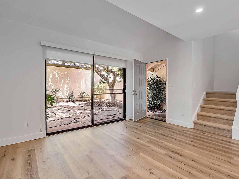 family room with access to front patio