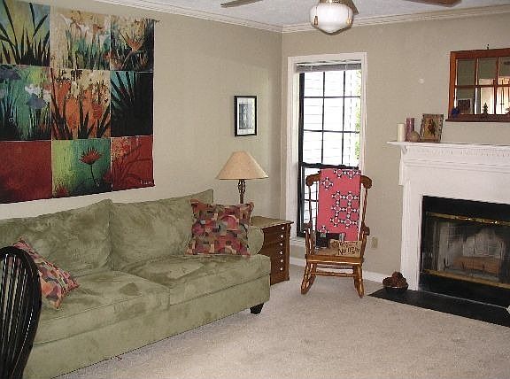 Spacious Living Room with a cozy fireplace.