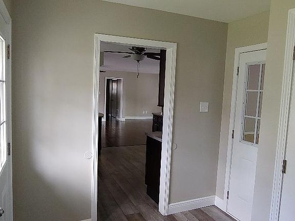 laundry room by kitchen