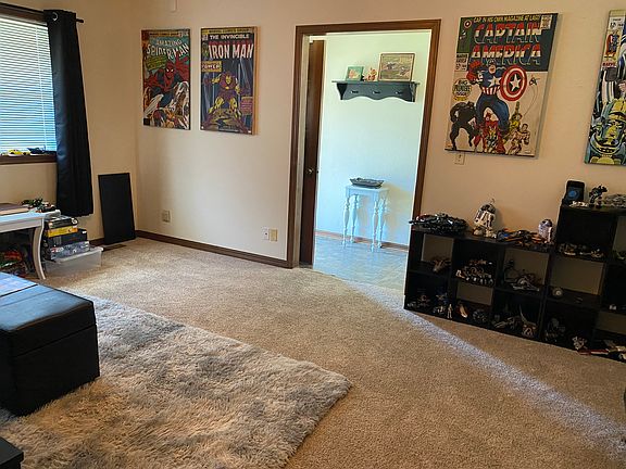 Living room view to the front entry.